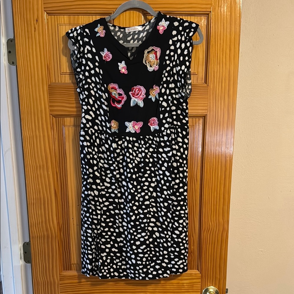 Black and White Sleeveless Dress with Floral Embroidery